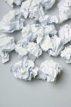 Crumpled paper wads on the floor - copy space below