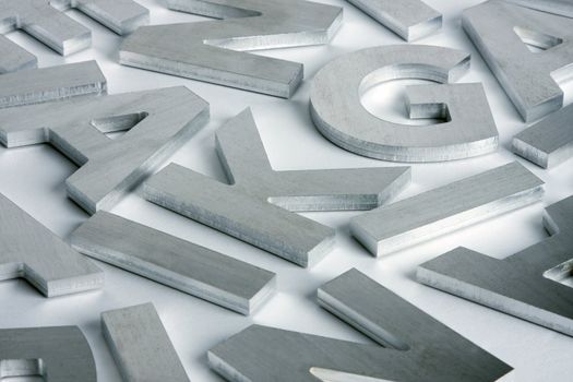 Stylish letters cut out of polished steel