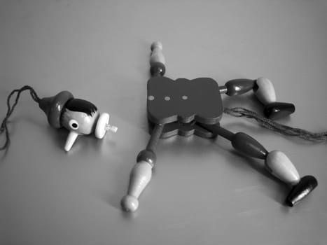 a puppet toy was broken, his head apart from the body