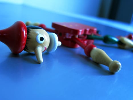 a puppet toy was broken, his head apart from the body