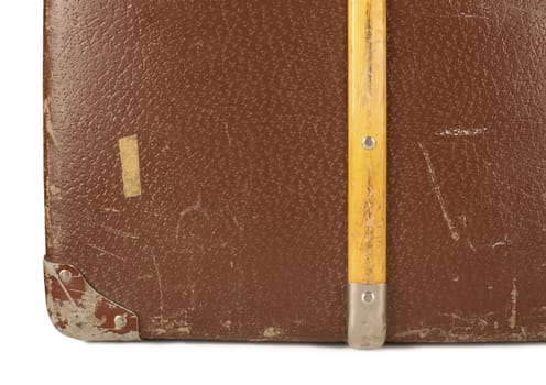 Close-up of an old and worn leather suitcase