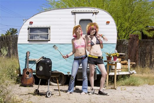 Two Young Punk Women in Front of a Trailer