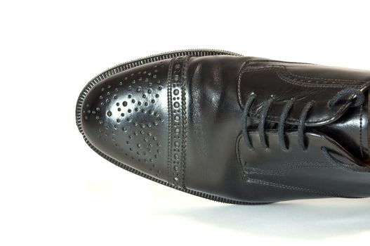 High resolution photo of a black men's shoe.