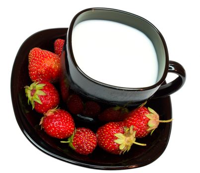 close-up cup of milk and strawberries, isolated on white