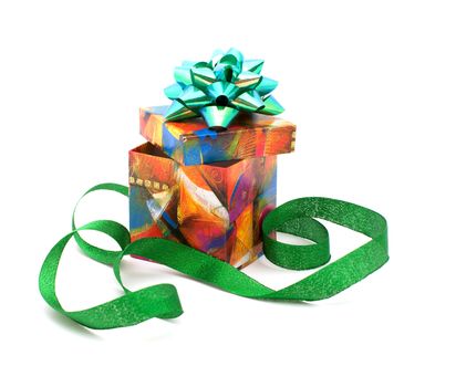 Gift box with a bow and a green ribbon on a white background.