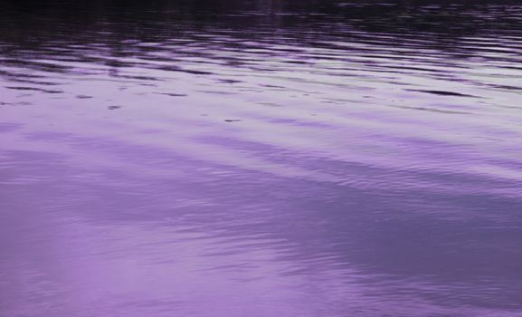 the calmness of the ripples of water in the sea