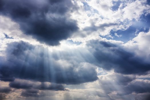dramatic sky with sunbeams