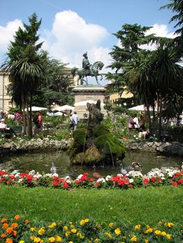 Picturesque fountain in hot weather