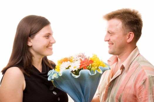 man, woman and flowers on a white background