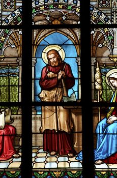 Detail of the color window - bullseye pane - lattice window. Public national monument - cathedral of St Vitus, Prague, Czech republic, Europe.