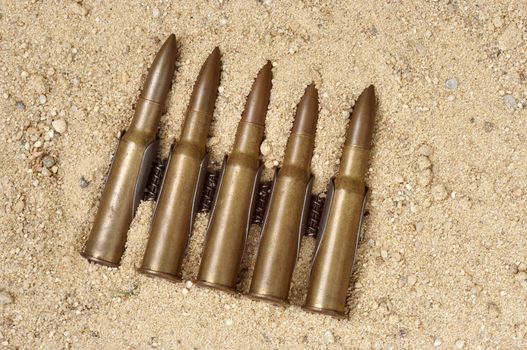 Detail of the ammunition on the sand