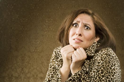 Frightened Hispanic Woman in Leopard Print Coat