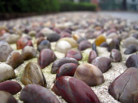 a close up for stones on a path way