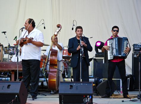 Taraf De Haidouks performs at Herastrau Summer Theater on June 17, 2009 in Bucharest, Romania.