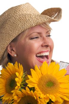 Attractive Blond with Cowboy Hat and Sunflower Isolated on a White Background.