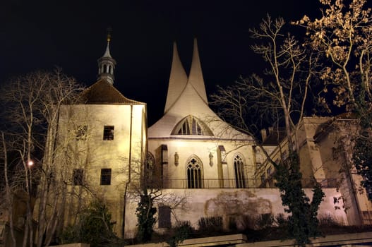 Emauzy - Benedictine monastery. Founded by Charles IV in 1347. All that survives are the capitular hall, imperial chapel and cloisters with mural paintings the valuable works of the Bohemian High Gothic art. Damaged during an air-raid on 14 February 1945. During the renovation in 1957 - 1969 two modern concrete spires were erected in the place of former towers. Prague, Czech republic, Europe.