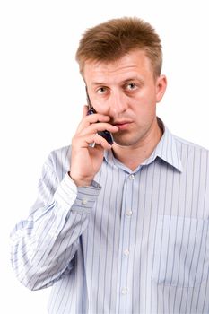 serious man with mobile phone on a white background