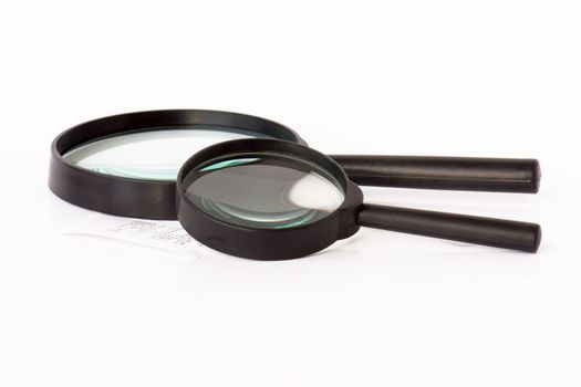 Two magnifying glass on a white background.