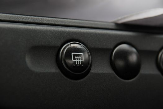 closeup of a button for in car conditioner control
