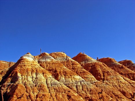 Deserted copper mine on a blue sky background