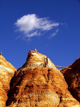 Deserted copper mine on a blue sky background