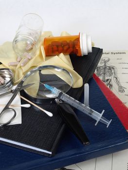 Various medical related charts and instruments isolated on a white background.