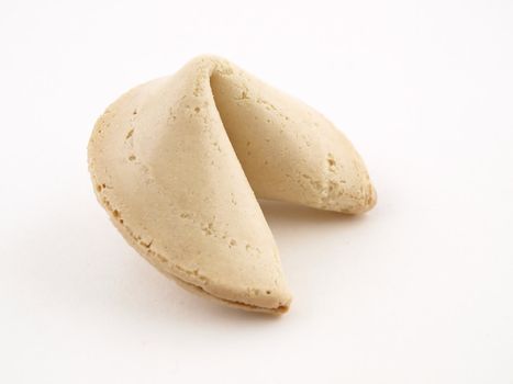 A Single Fortune cookie isolated on a white background