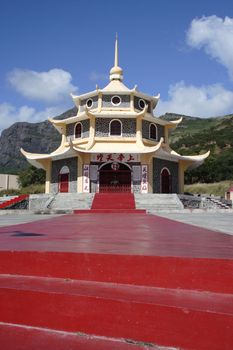 Image of Thien Thane, a pagoda in Port Louis, Mauritius. Portrait orientation.