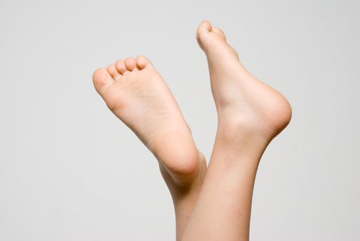 Children's feet on a light background