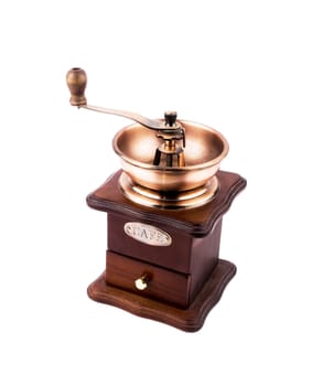 Old-fashioned coffe-mill on white background