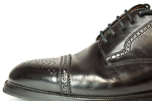 High resolution photo of a black men's shoe.