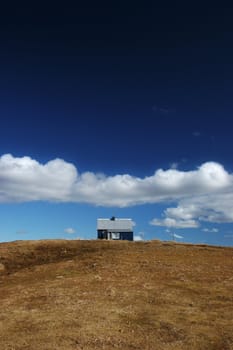 Isolated house on a hill in the countryside