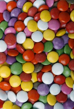 Background of multi colored smarties candy