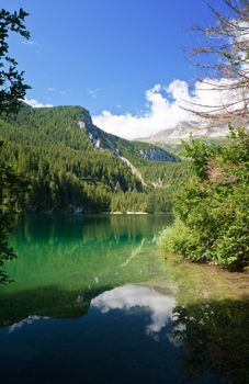 summer view of a beautiful lake in Italian alps