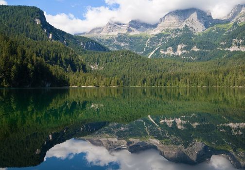 summer view of a beautiful lake in Italian alps