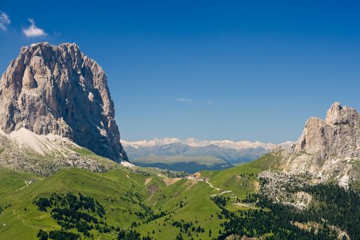 Summer view of Sella pass with Sassolungo mountain, Italy