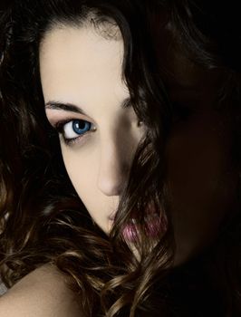 Close-up portrait of a young woman with beautiful blue eyes 