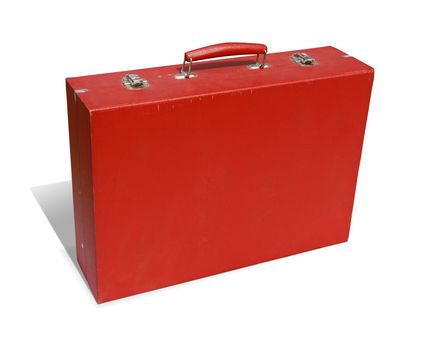 Bright red suitcase from the fifties isolated on white