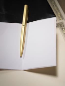 selective focus on the pen and greeting card