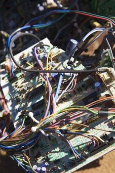 Wires and old broken electrical car components.