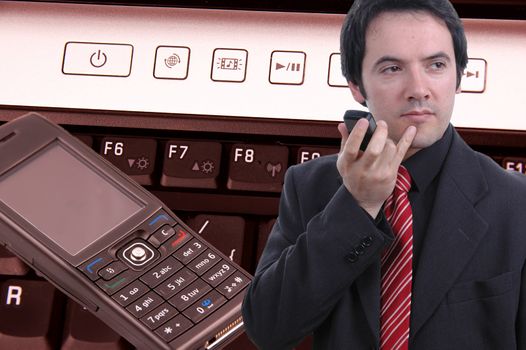businessman, keyboard and cell phone
