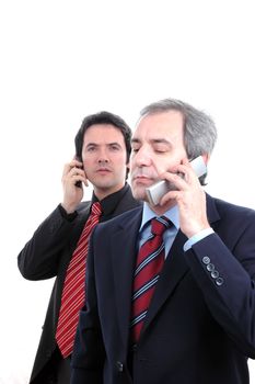two businessman at cellphone