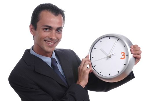 young businessman holding wall clock