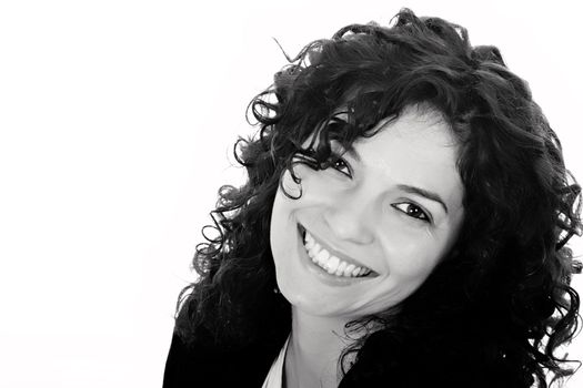 Portrait of beautiful brunette woman smiling in black and white.