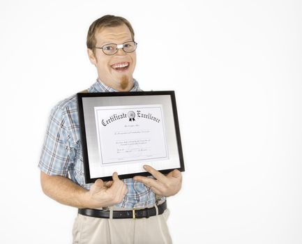 Caucasian young man dressed like nerd holding certificate and smiling.