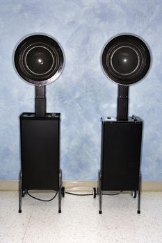 Hair styling and drying chairs at women's salon.