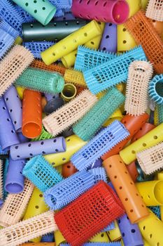 Close-up of pile of hair curlers.