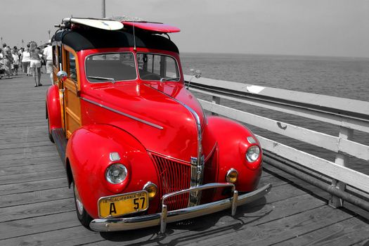 Red Woodie on a Pier with black and white background