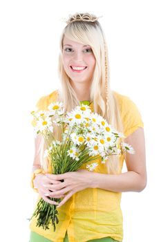 Smiling young blond girl with bunch of flowers