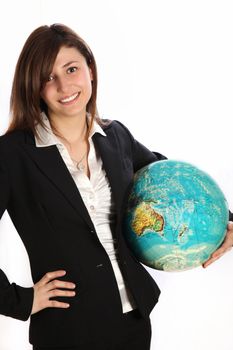 Young woman carrying a globe under his arm. She wears a black suit and smiling.